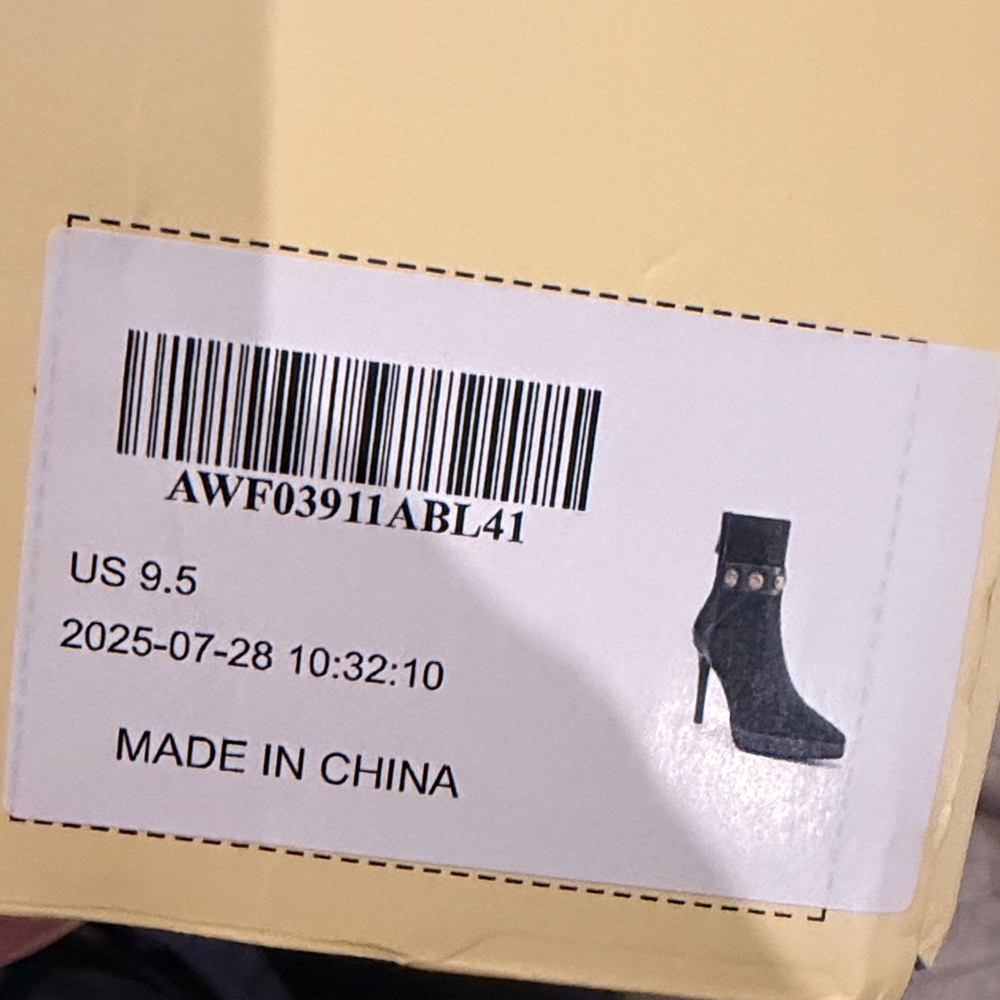 Chic Black Heeled Ankle Boots with Gold Accents - Picture 8 of 8